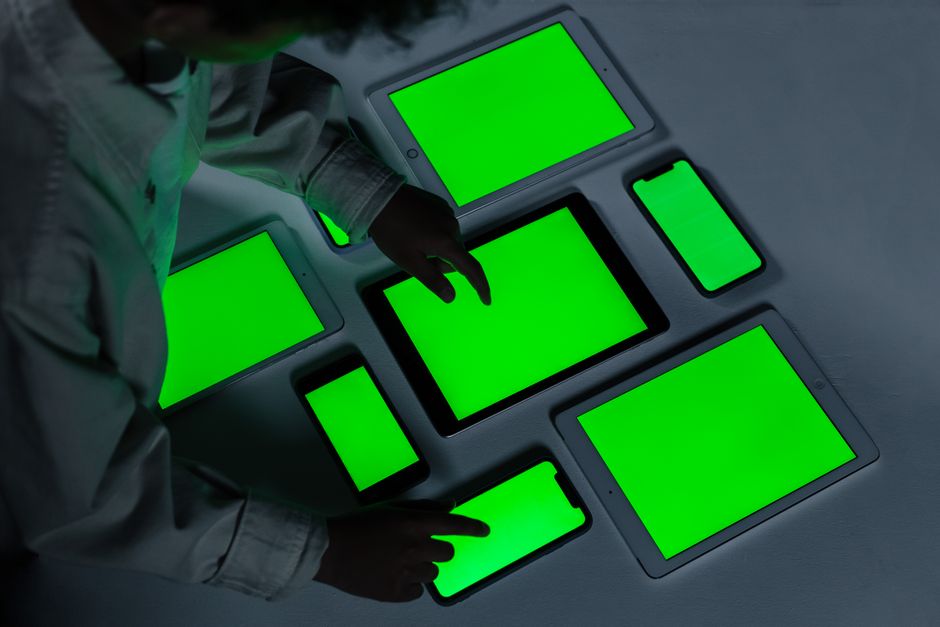 A real estate professional's hands interacting with a futuristic digital interface on a screen, representing an AI-powered marketing pipeline for lead generation.